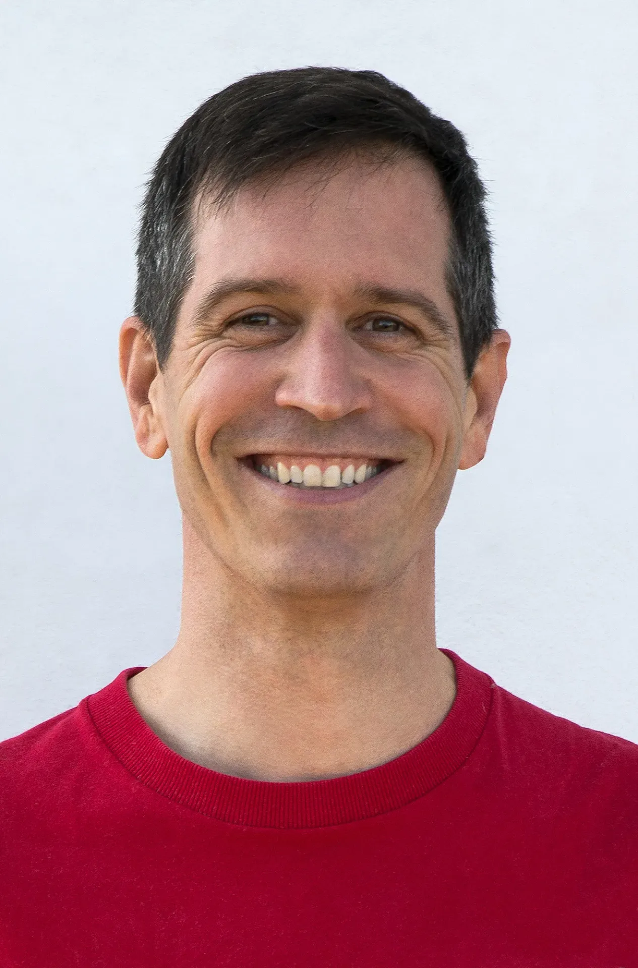 Portrait of Philippe Max Marty in natural setting, showing calm presence central to TCM practitioner's role.